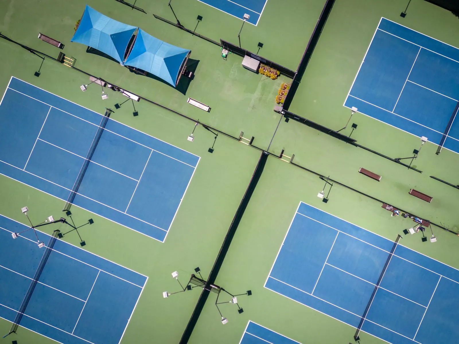 Aerial view of blue tennis courts