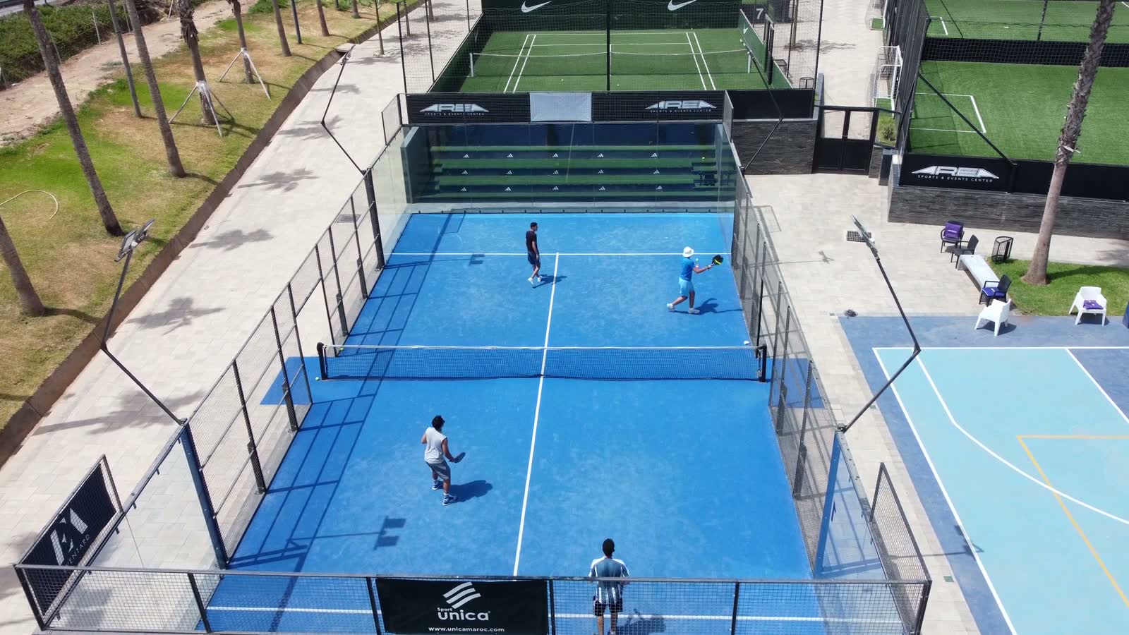Padel courts in play, seen from above